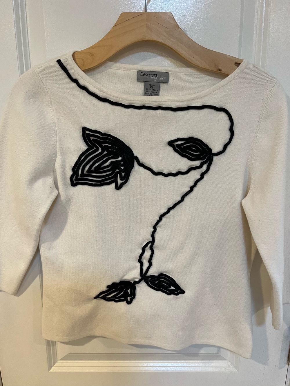 Designers Originals Cream Knit Top with Black Floral Appliqué